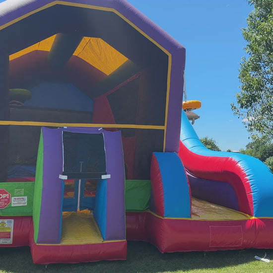 Video walkthrough of a colorful bounce house with vibrant slide, climbing wall, and spacious play area, perfect for kids' parties and events.